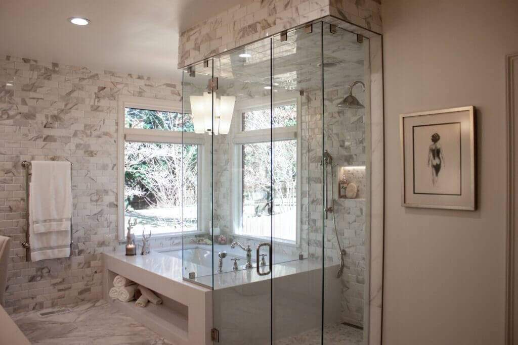 open bathroom with marble tub