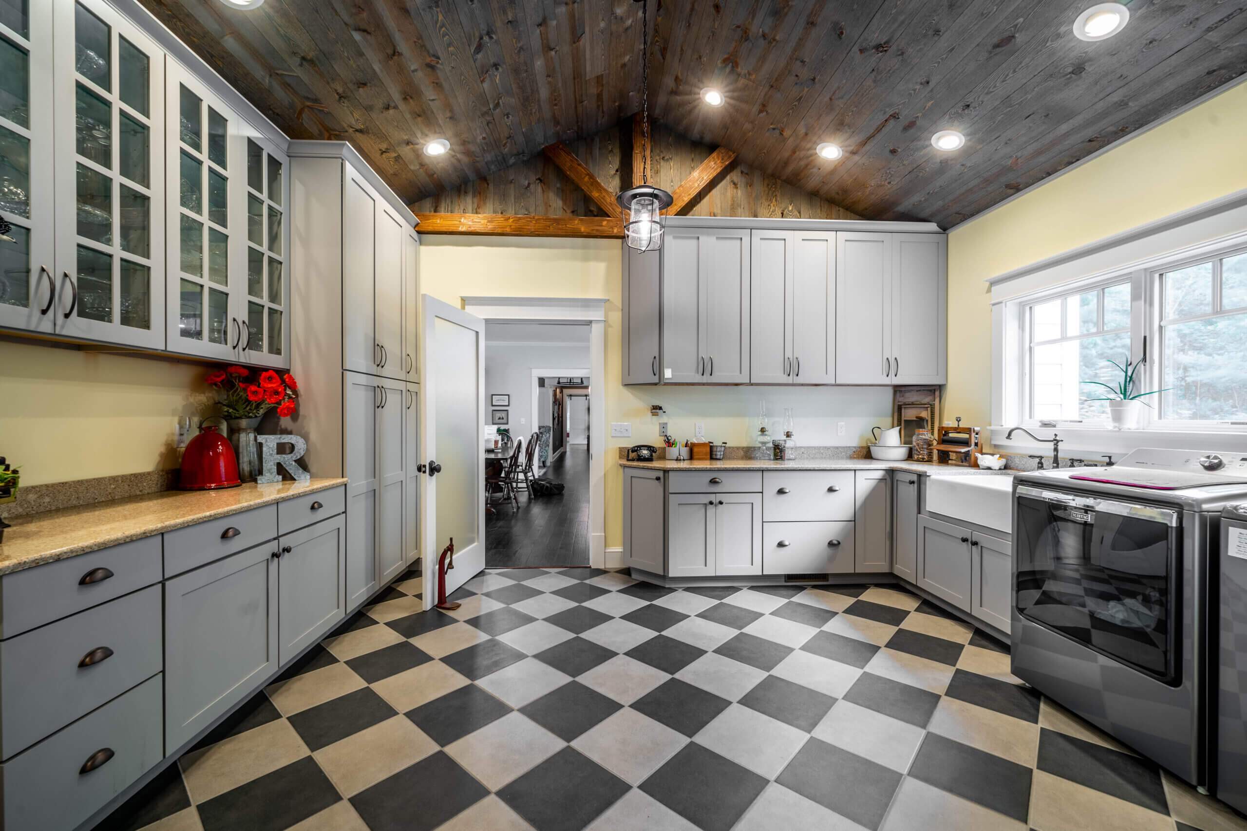 rustic mudroom with gray cabinets