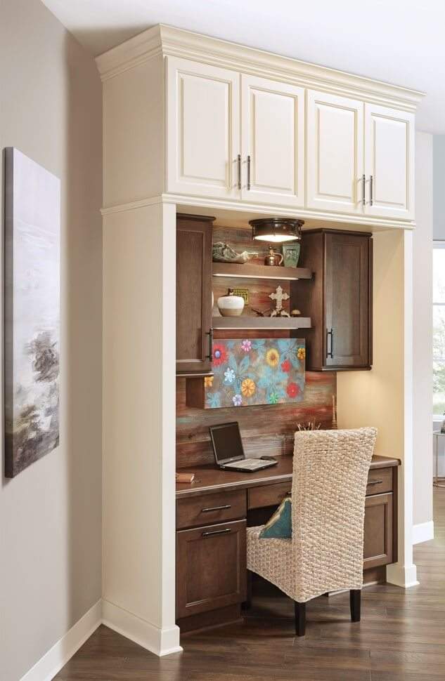 White home office nook with brown stained lowers as an alternative use for kitchen cabinets